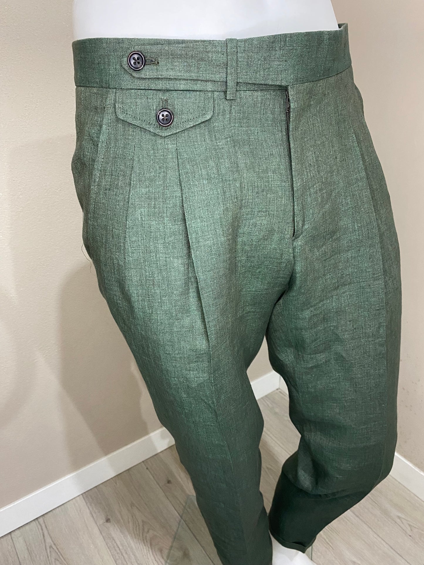 Trousers with extended belt
